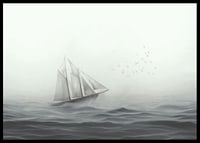 Sailboat with big white sails on foggy sea in grayscale-6