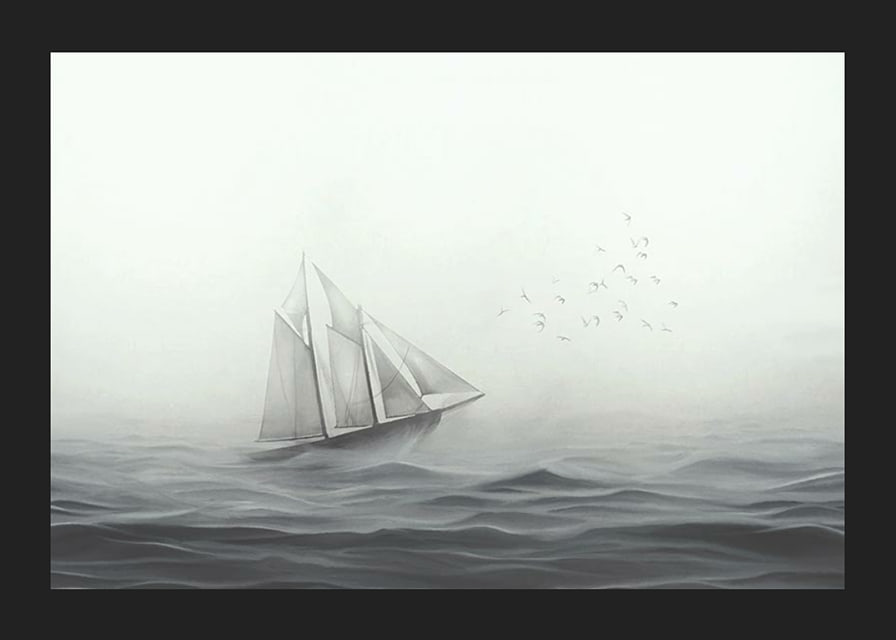 Sailboat with big white sails on foggy sea in grayscale-12