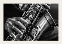 Black and white photo of hands playing a saxophone-3