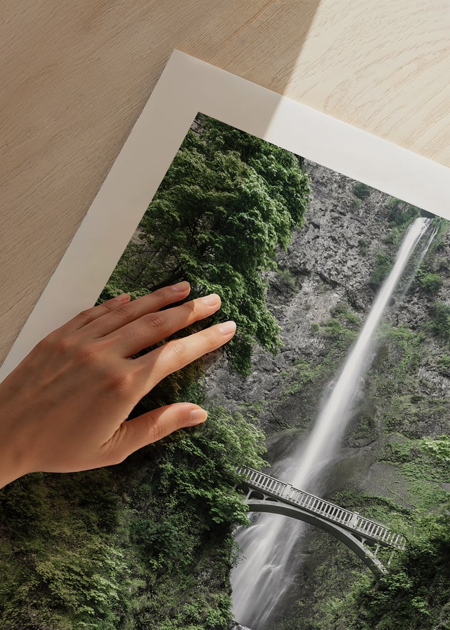 High waterfall with stone bridge, surrounded by greenery, photographic-12