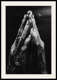 Black and white close-up of worn, dirty hands in prayer position-4