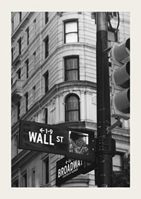 Black and white photographed road sign with text Wall Street-3
