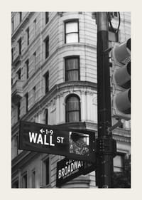 Black and white photographed road sign with text Wall Street-3