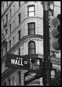 Black and white photographed road sign with text Wall Street-6