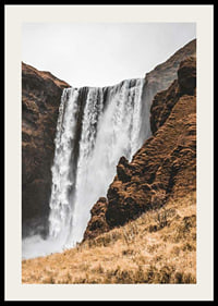 Fotografi av Skogafoss vattenfall mot bruna klippor-2