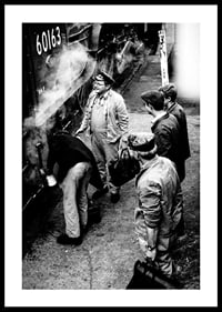 Black and white photo of men by steam locomotive on railway platform-0