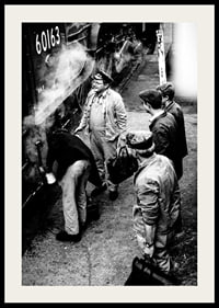 Black and white photo of men by steam locomotive on railway platform-2
