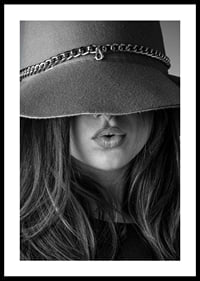 Black and white fashion image of woman with big hat and long hair-0