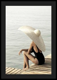 Photograph of woman in black swimsuit with large bright hat-4
