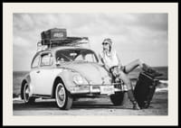 Black and white vintage photograph of woman by Volkswagen Beetle-2