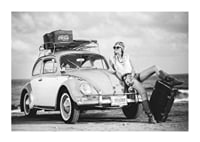 Black and white vintage photograph of woman by Volkswagen Beetle-1