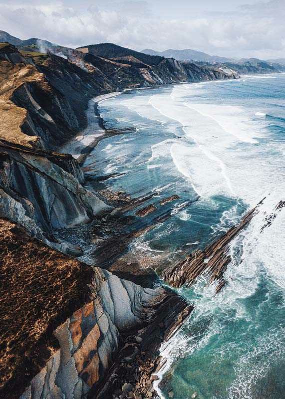 Photographic coastal landscape with cliffs and blue sea-12