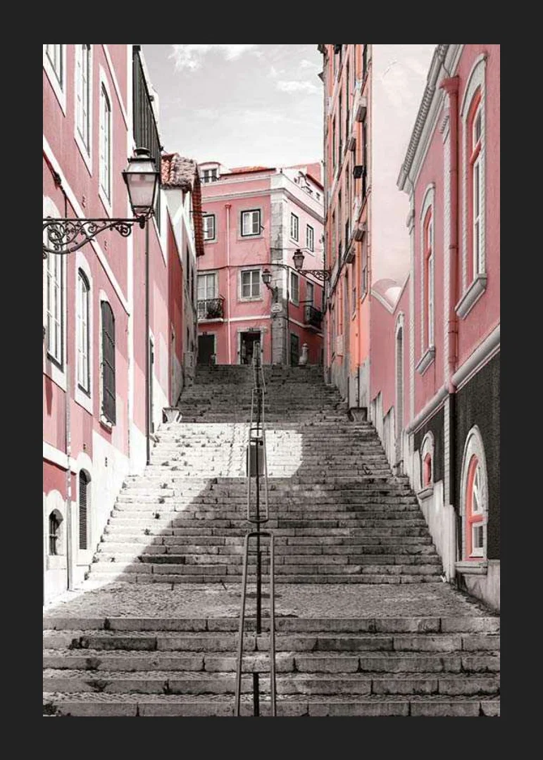 Photograph of steep staircase surrounded by pink houses in Lisbon-12
