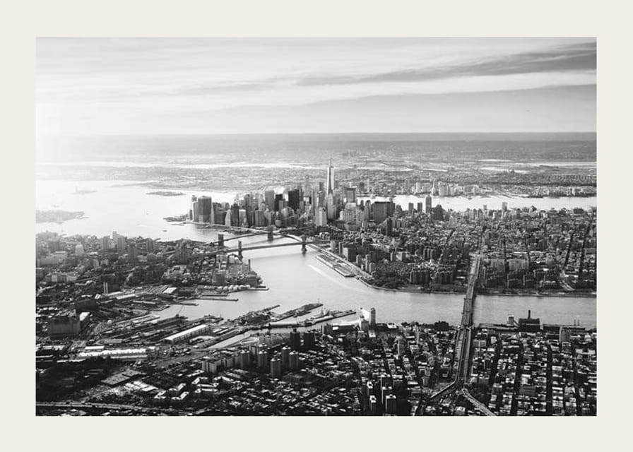 Black and white aerial view of Manhattan with bridges and skyscrapers-12