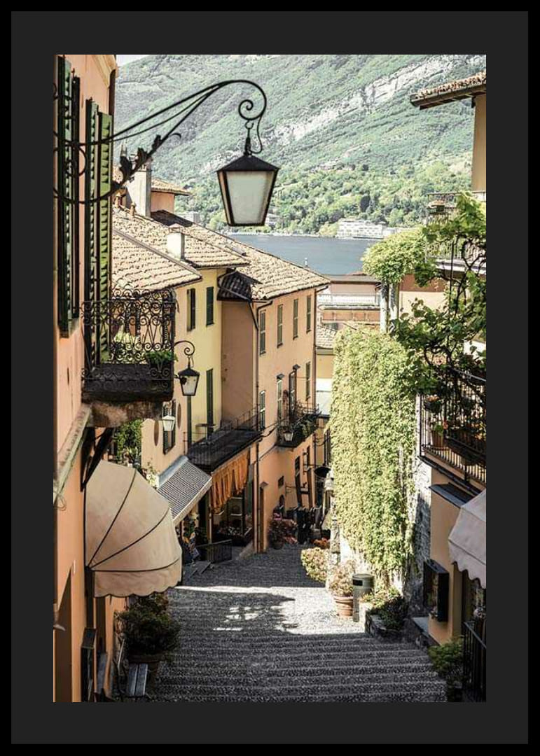 Photograph of narrow alley in Bellagio with pastel colored houses-12