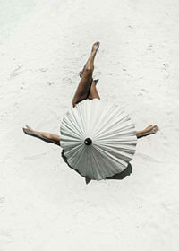 Photographic motif with woman and white parasol on sandy beach-7