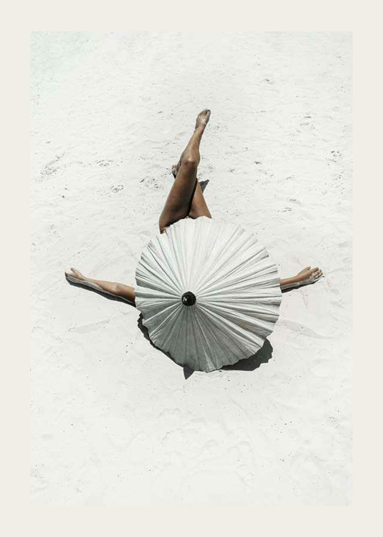 Photographic motif with woman and white parasol on sandy beach-12