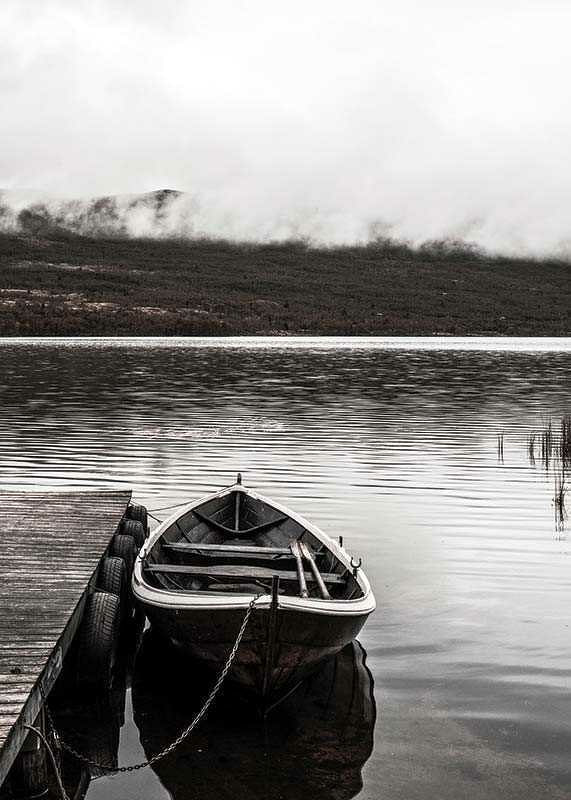 Photographic echo at jetty in foggy mountain lake, muted colors-12