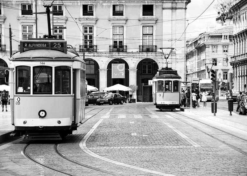 Black and white photograph of two classic trams in Lisbon-12