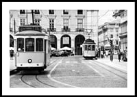 Black and white photograph of two classic trams in Lisbon-0