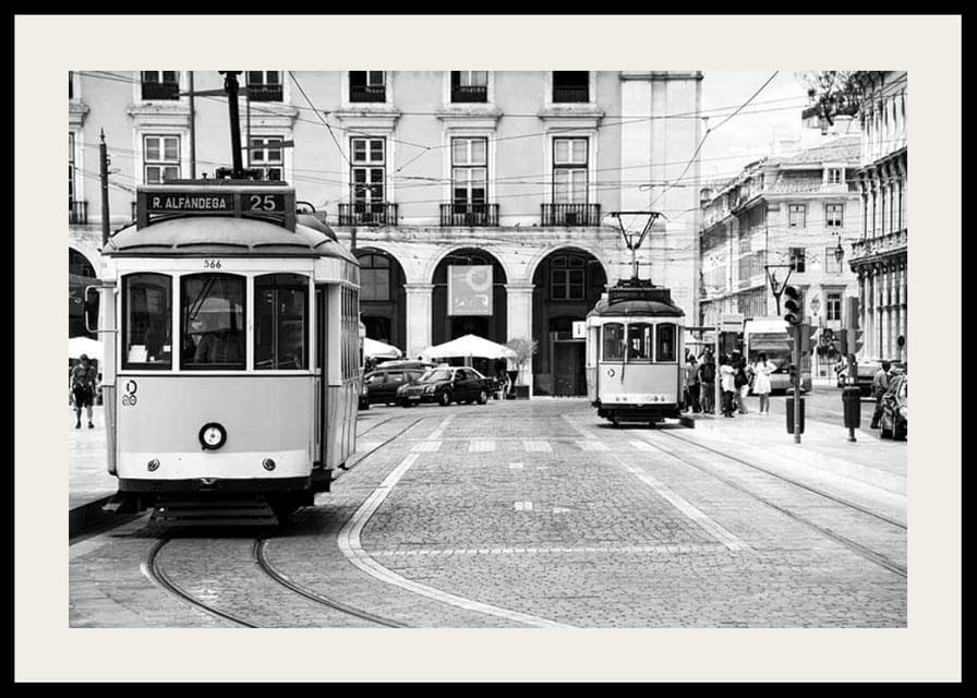 Black and white photograph of two classic trams in Lisbon-12