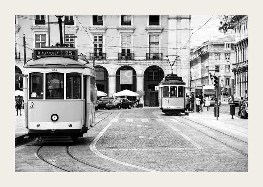 Black and white photograph of two classic trams in Lisbon-12