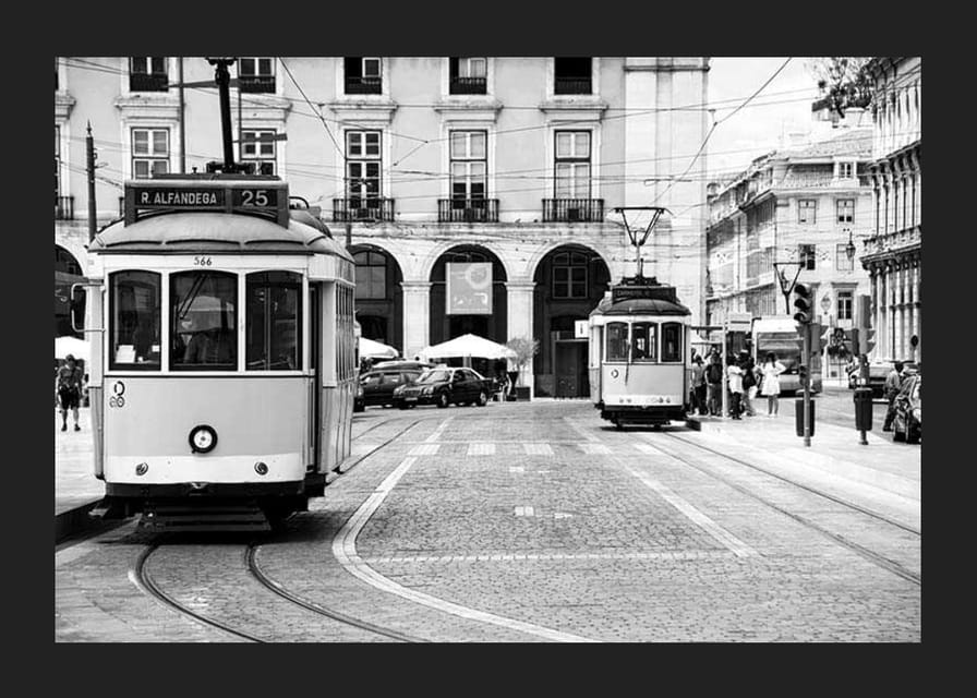 Black and white photograph of two classic trams in Lisbon-12