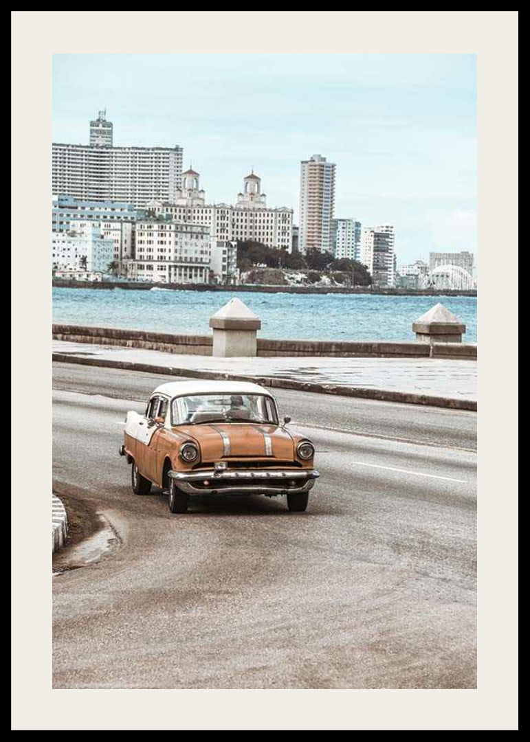 Photograph of orange and white vintage car on boardwalk-12