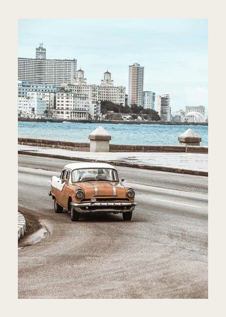 Photograph of orange and white vintage car on boardwalk-12