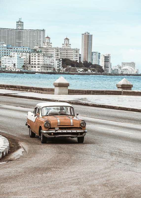 Photograph of orange and white vintage car on boardwalk-12