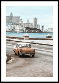 Photograph of orange and white vintage car on boardwalk-0