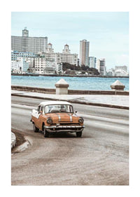 Photograph of orange and white vintage car on boardwalk-1