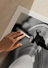 Black and white close-up of vinyl player with vinyl record on it-9