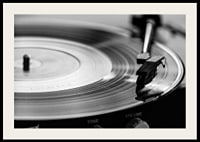Black and white close-up of vinyl player with vinyl record on it-2
