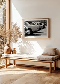 Black and white photography of classic cars in a row in a parking lot-8