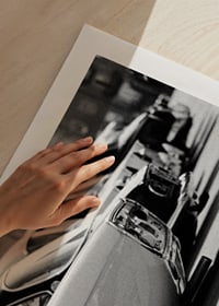 Black and white photography of classic cars in a row in a parking lot-9