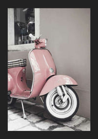 Photograph of pink Vespa scooter in retro style against wall-5