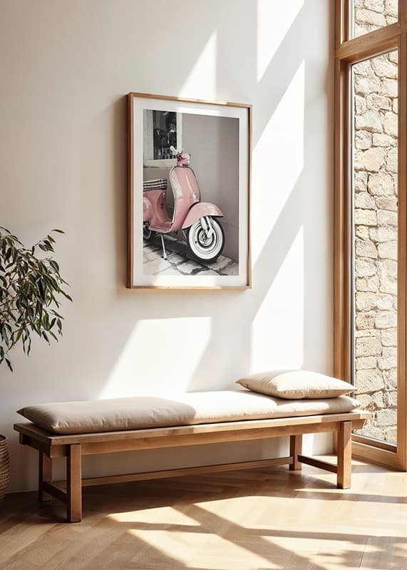 Photograph of pink Vespa scooter in retro style against wall-12