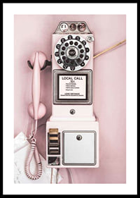 Pink retro payphone with dial on light pink wall-0