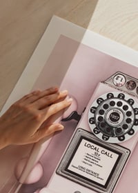 Pink retro payphone with dial on light pink wall-9