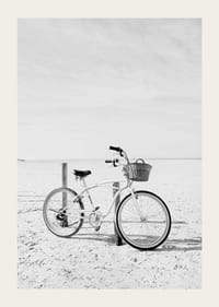 Black and white beach scene with retro bicycle and bicycle basket-3