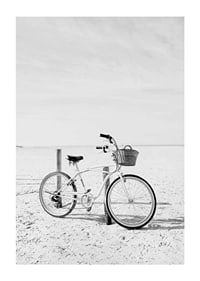 Black and white beach scene with retro bicycle and bicycle basket-1