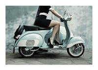 Photograph of woman on light blue retro scooter against gray wall-1