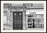 Black and white photo of classic Parisian cafe facade and gate-2