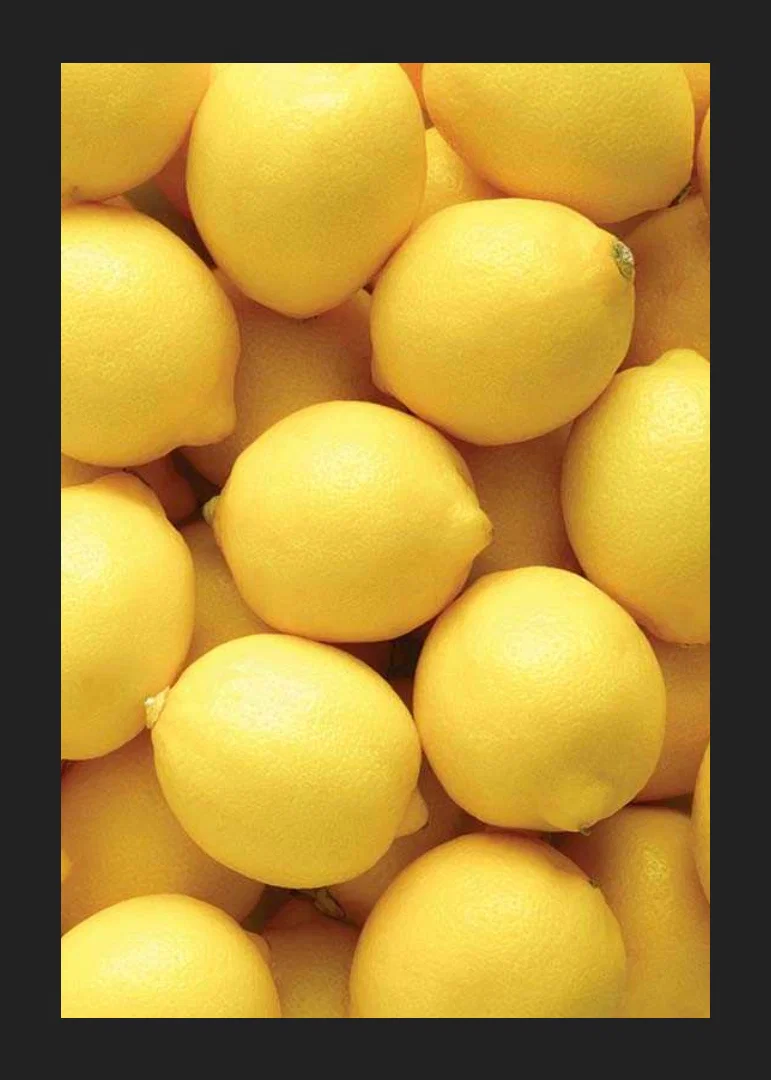 Close-up of yellow lemons in a dense pattern, photographic style-12