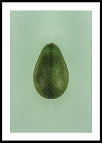 Photograph of whole green avocado against a solid green background-0