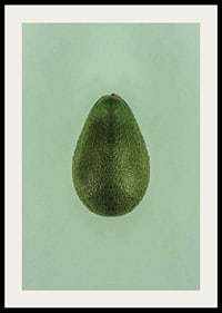 Photograph of whole green avocado against a solid green background-2