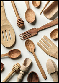 Photograph of various wooden kitchen utensils against a light background-6