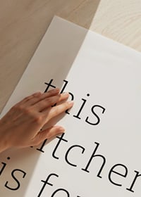 Black minimalist text on white background with kitchen message-3