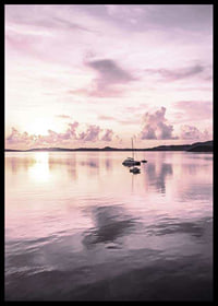 Photograph of sailboat on calm sea with purple sunset-6